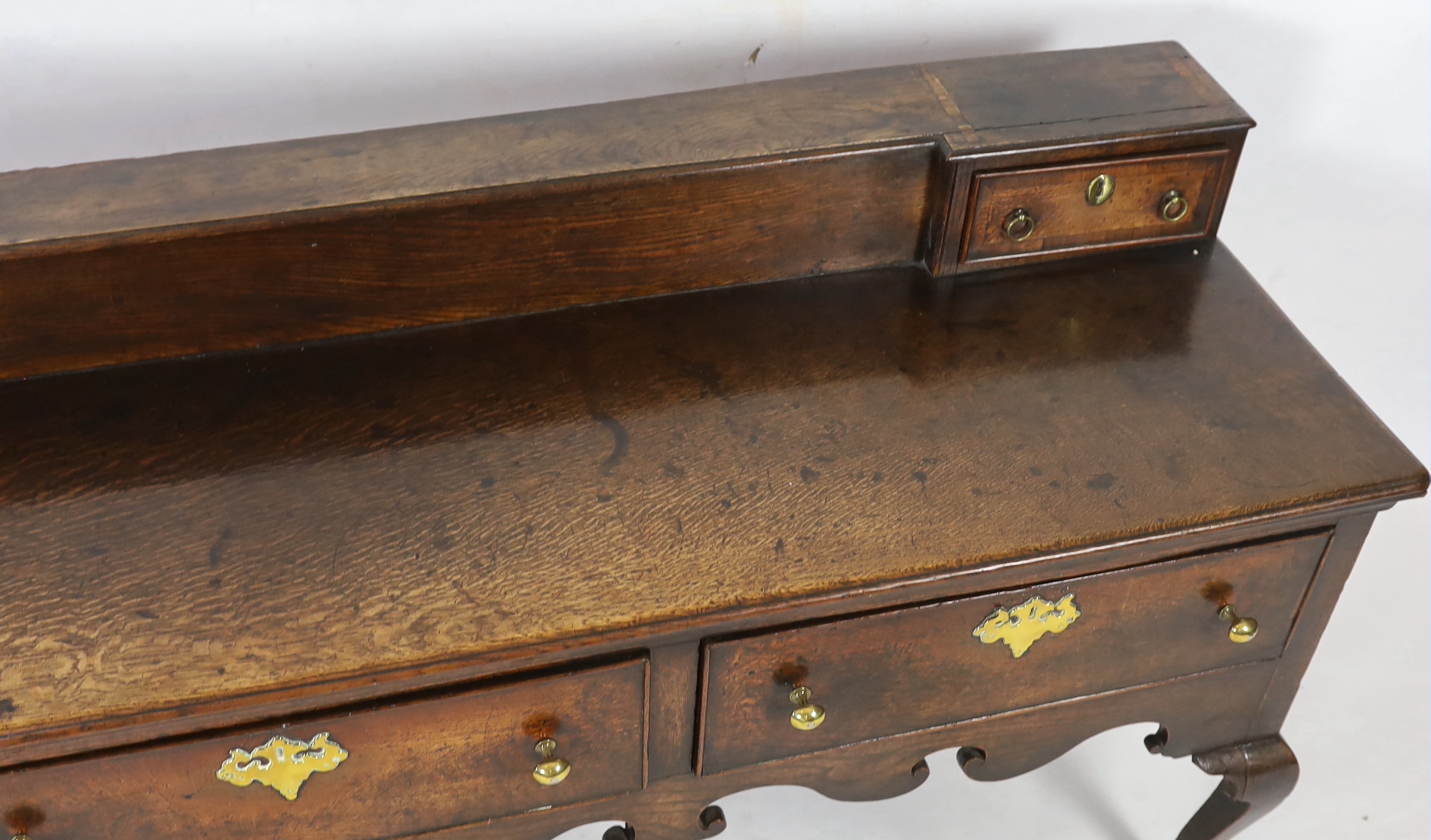 A late 18th century oak dresser base